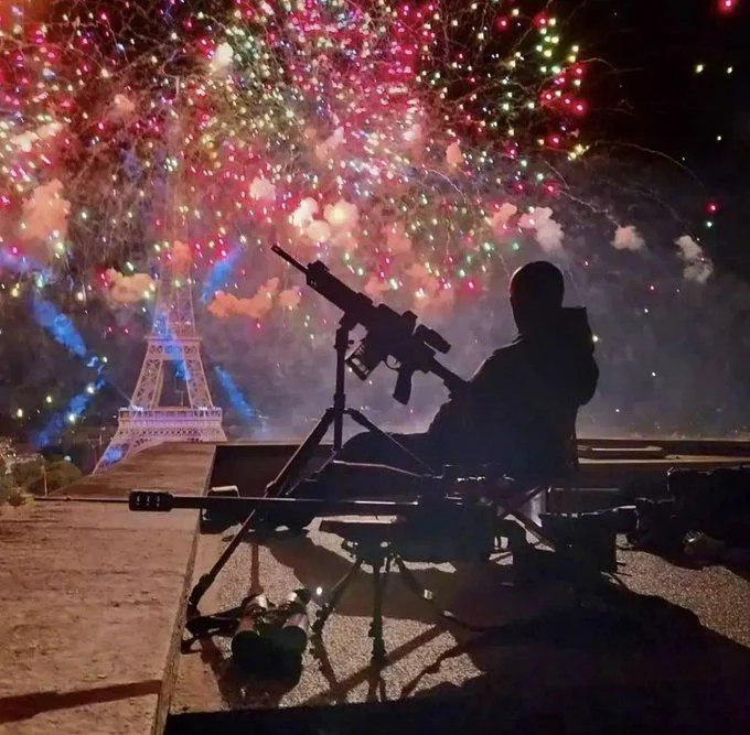 French Search and Intervention Brigade overlooking the Eiffel Tower